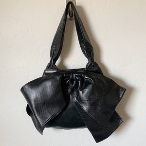Erva Black Patent Leather Bow Front Handbag